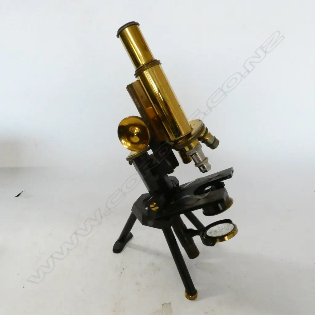 J.SWIFT & SON, LONDON BRASS COMPOUND MONOCULAR MICROSCOPE, RAISED ON FIXED TRIPOD BASE, IN MAHOG BOX Image 1++